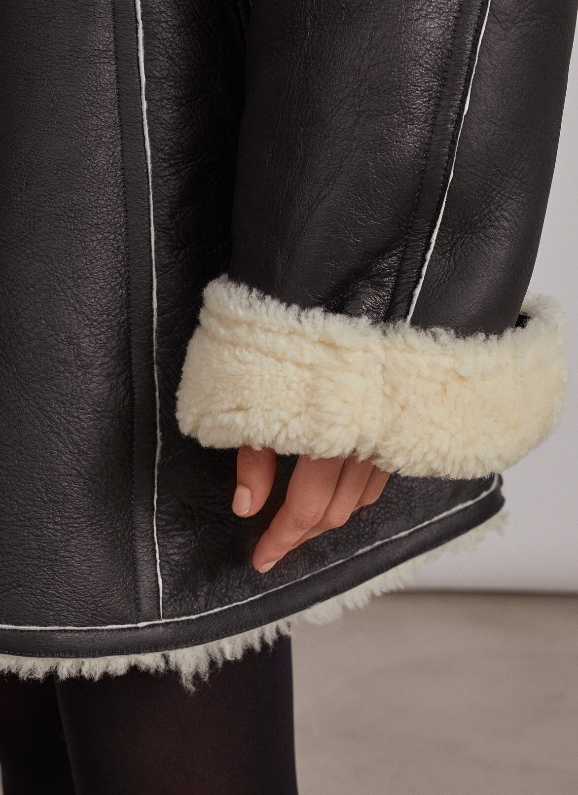 Coats ALAÏA BLACK COATS